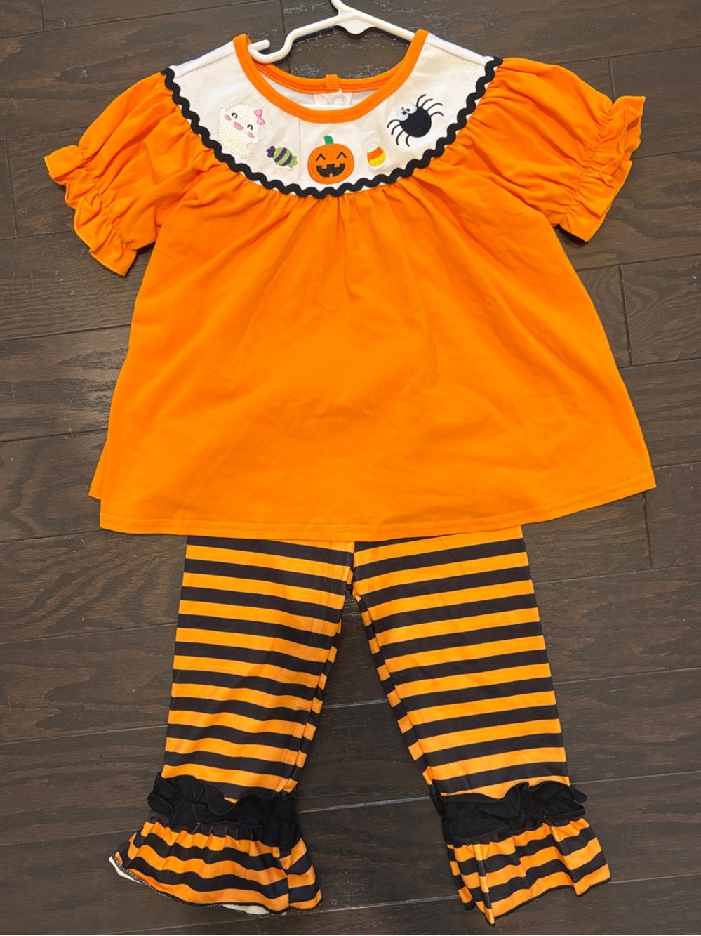 Girls Orange Pumpkin & Spider Ruffle Top with Orange/Black Striped Flare Bottoms